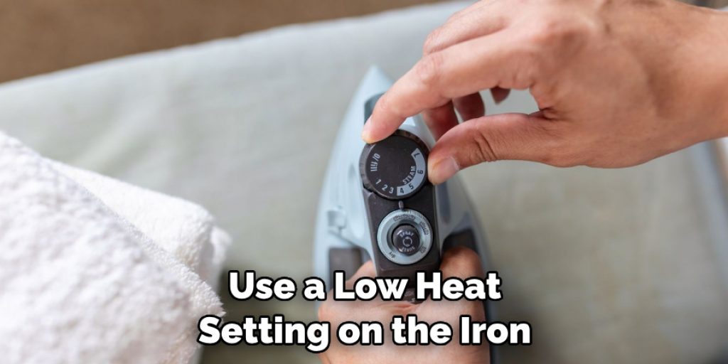 Use a Low Heat Setting on the Iron