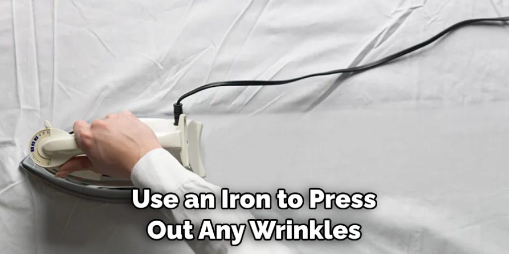 Use an Iron to Press Out Any Wrinkles