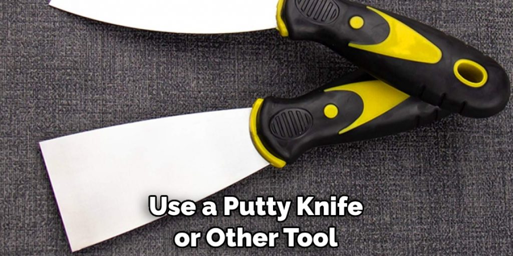 Use a Putty Knife or Other Tool