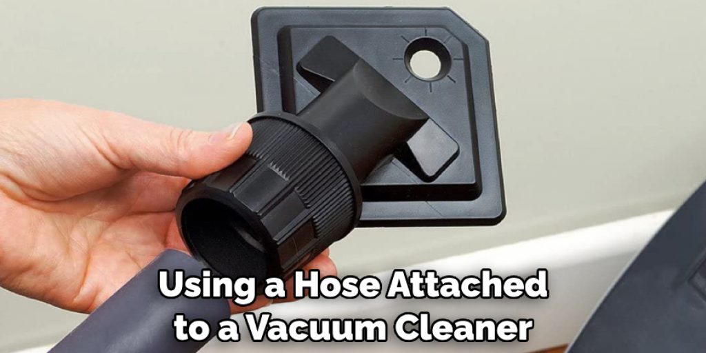 Using a Hose Attached to a Vacuum Cleaner