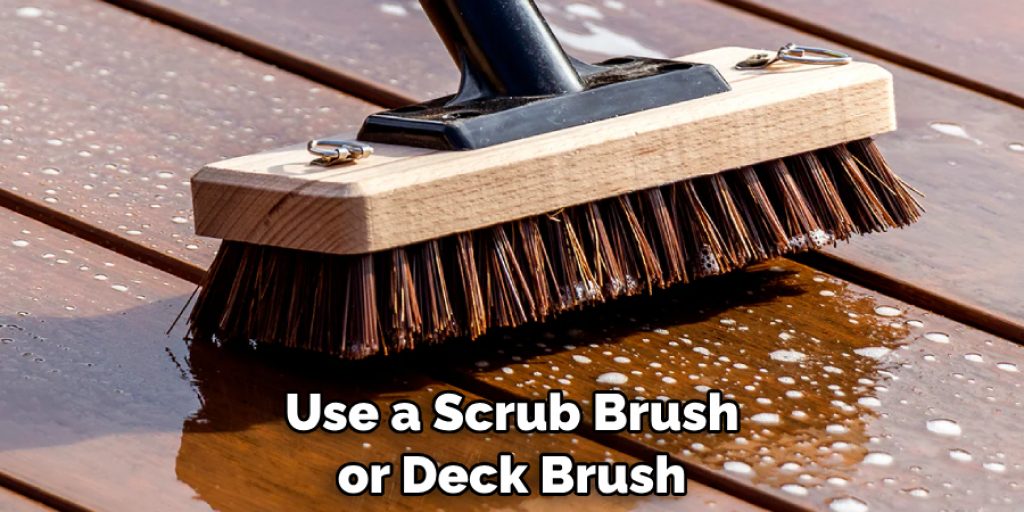 Use a Scrub Brush or Deck Brush