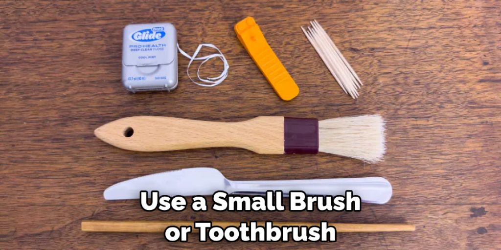 Use a Small Brush or Toothbrush