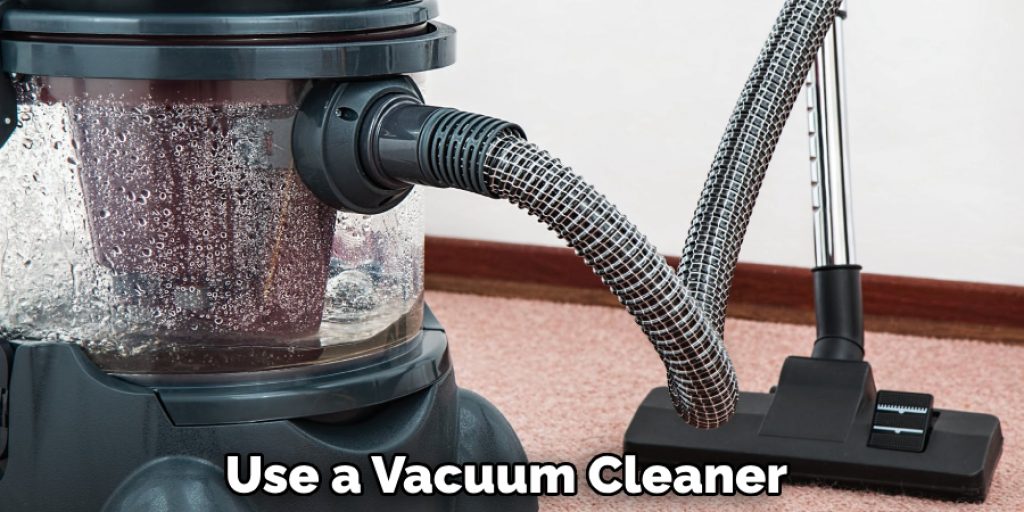 Use a Vacuum Cleaner