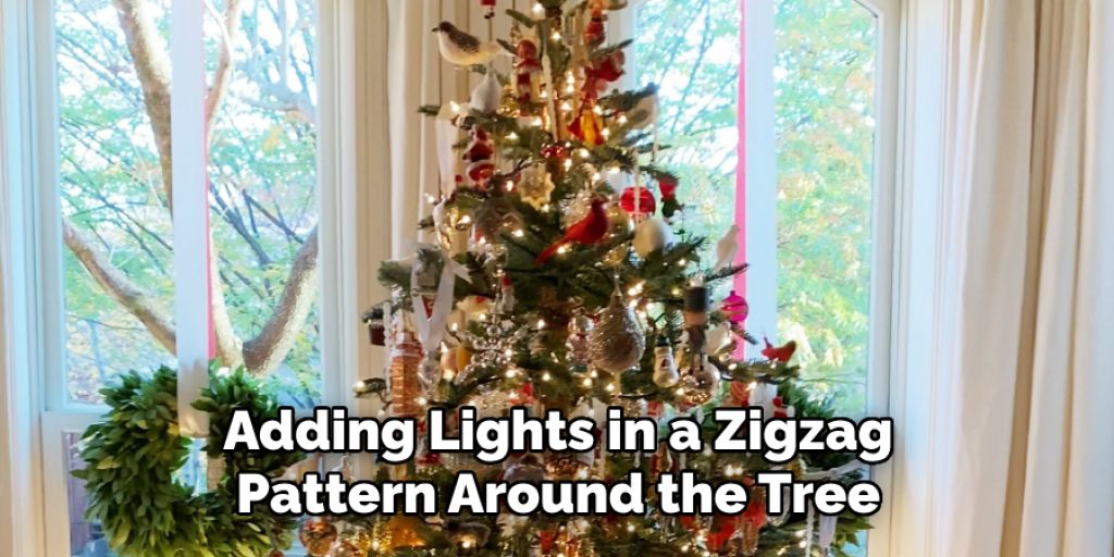 Adding Lights in a Zigzag Pattern Around the Tree