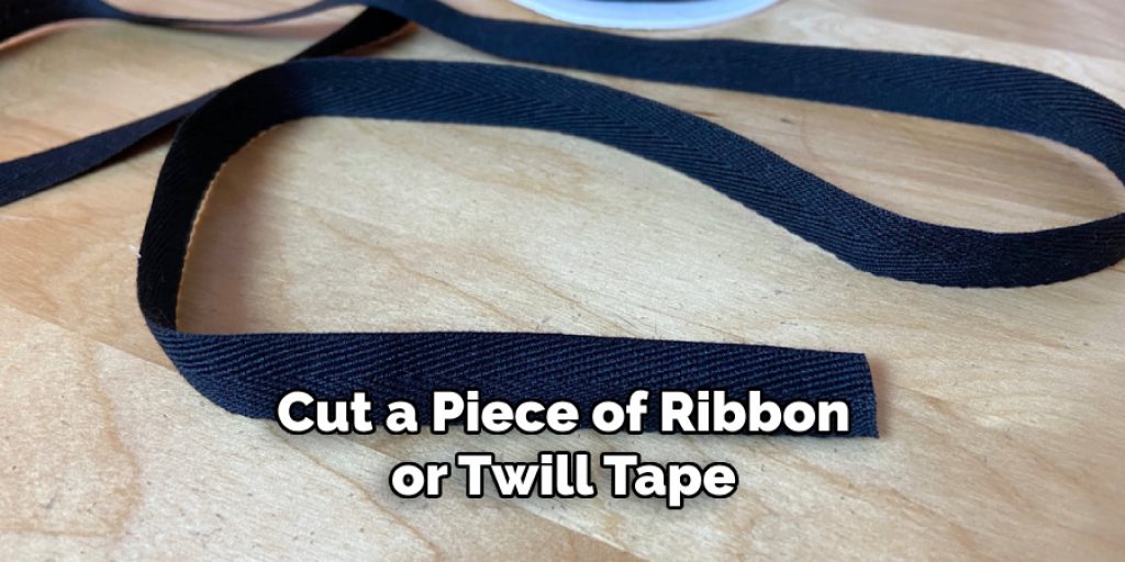 Cut a Piece of Ribbon or Twill Tape