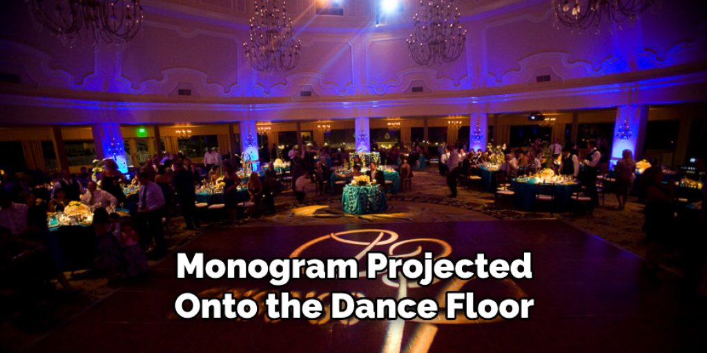 Monogram Projected Onto the Dance Floor