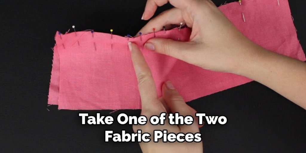 Take One of the Two Fabric Pieces