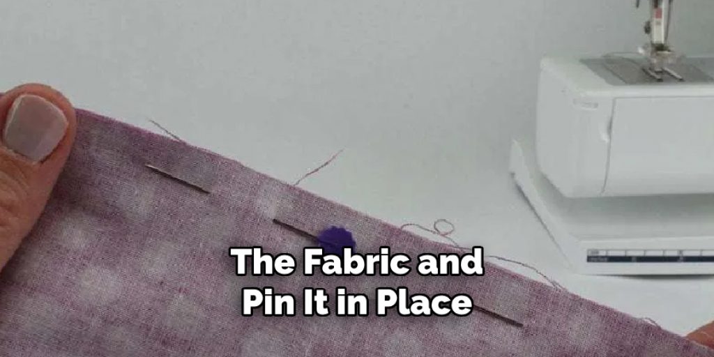 The Fabric and Pin It in Place