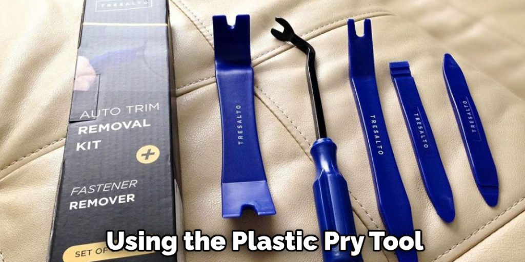 Using the Plastic Pry Tool