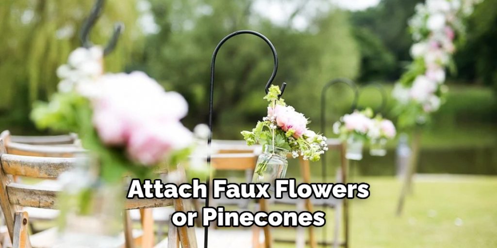 Attach Faux Flowers or Pinecones