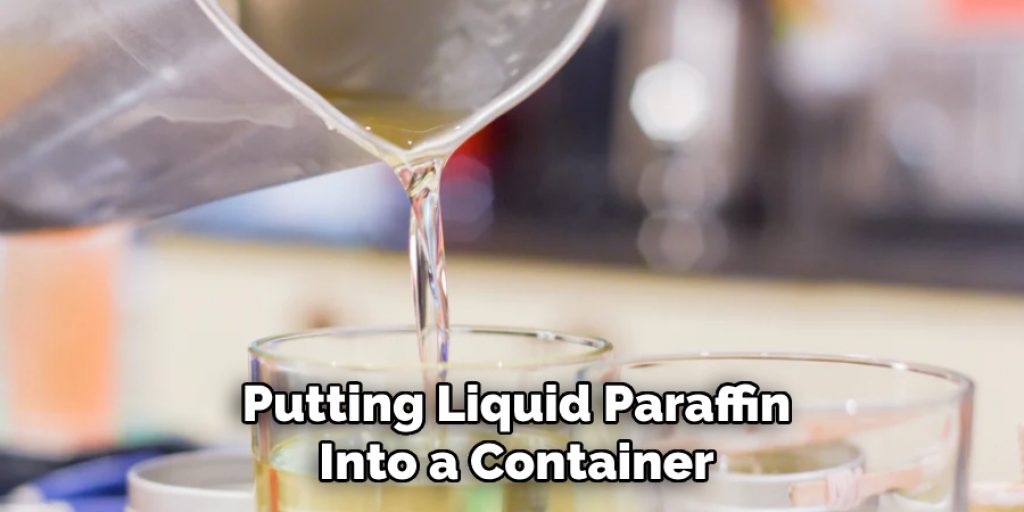 Putting Liquid Paraffin Into a Container