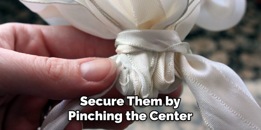 Secure Them by Pinching the Center