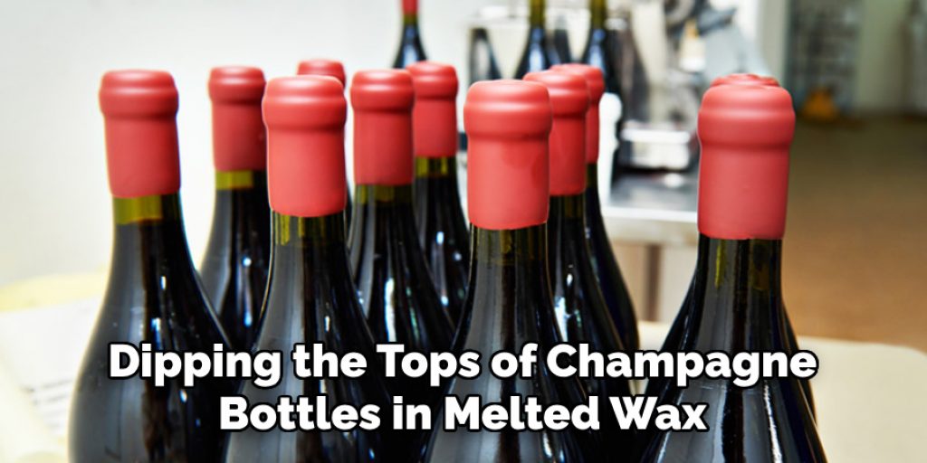 Dipping the Tops of Champagne Bottles in Melted Wax