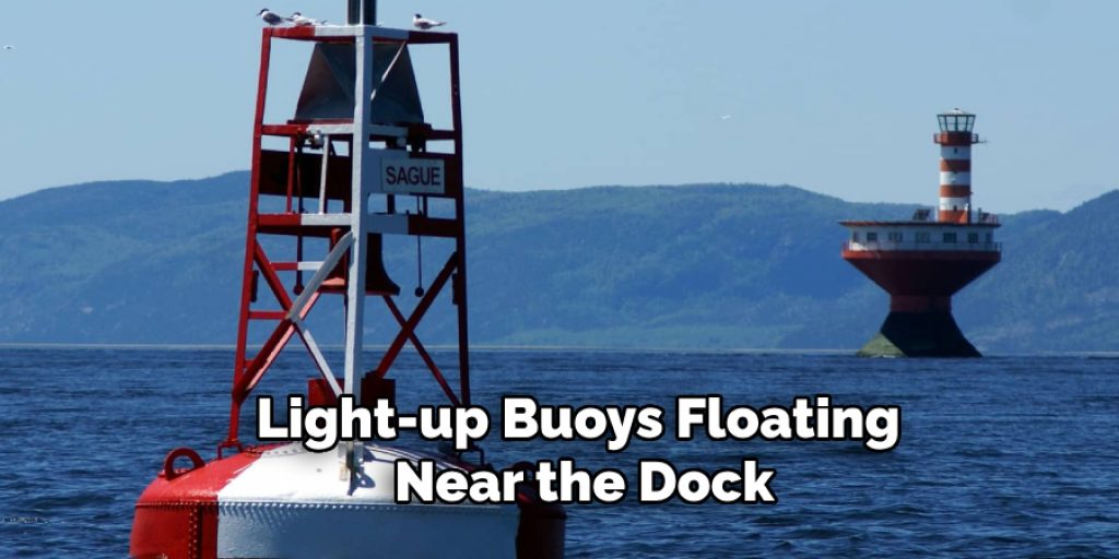 Light-up Buoys Floating Near the Dock