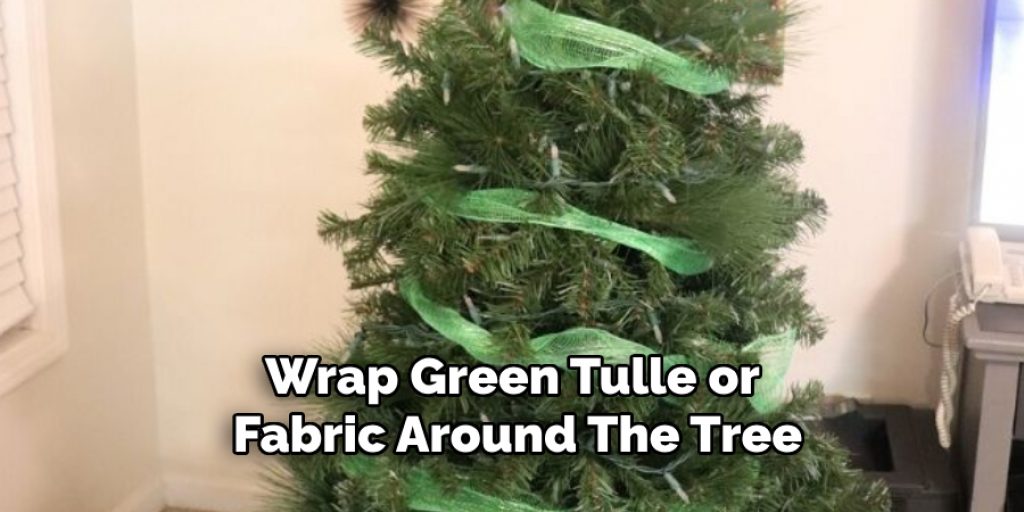 Wrap Green Tulle or Fabric Around the Tree