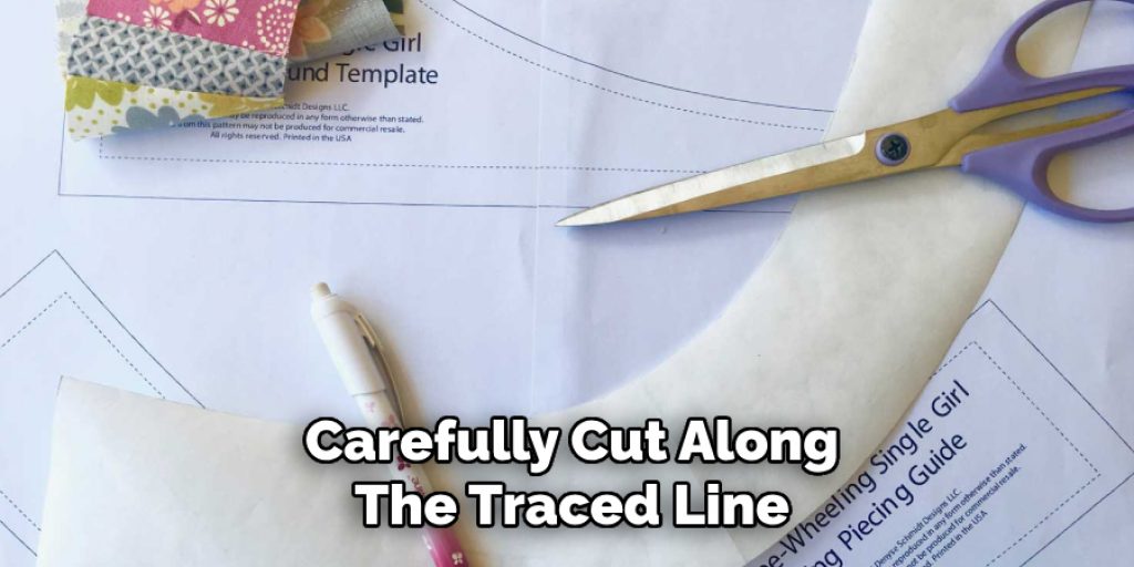 Carefully Cut Along
The Traced Line