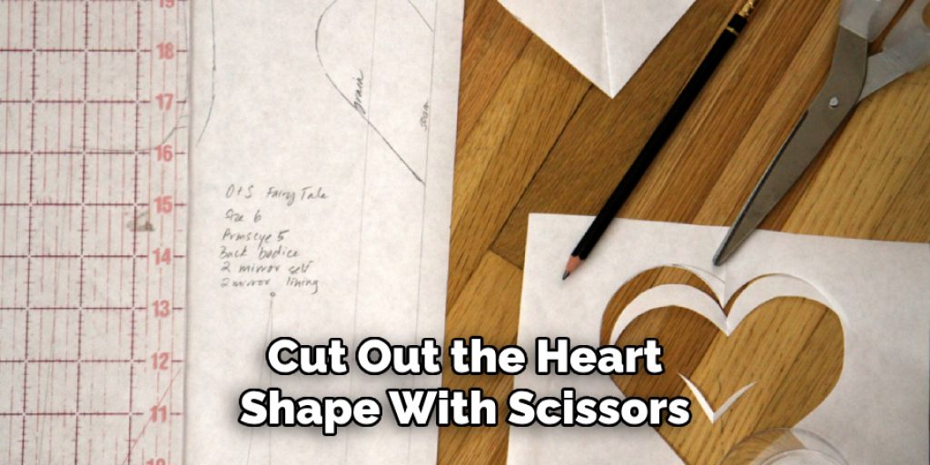 Cut Out the Heart
Shape With Scissors