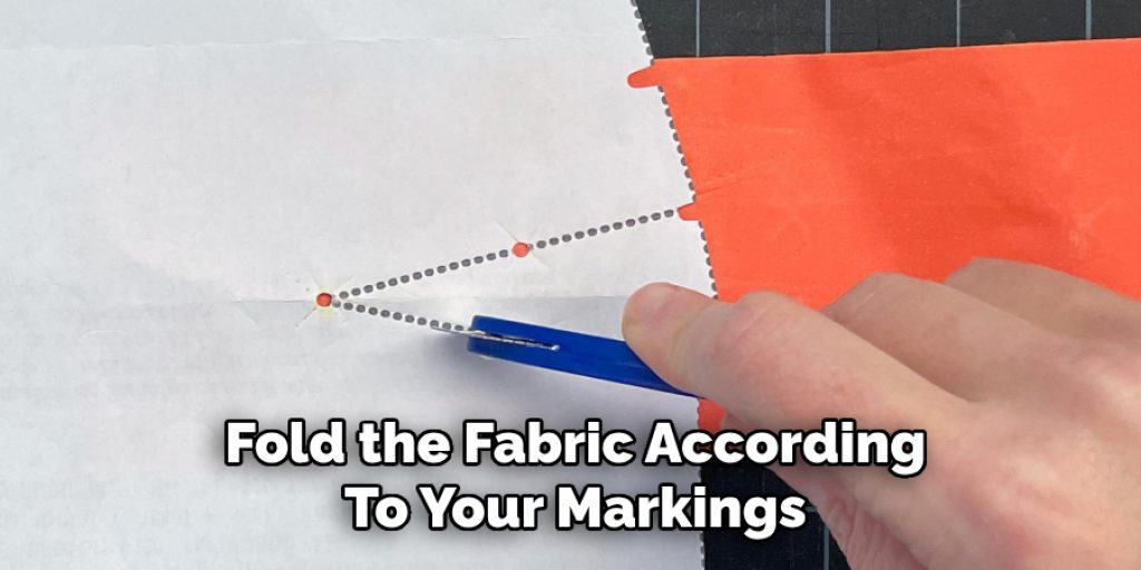 Fold the Fabric According
To Your Markings