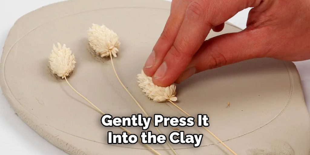 Gently Press It
Into the Clay