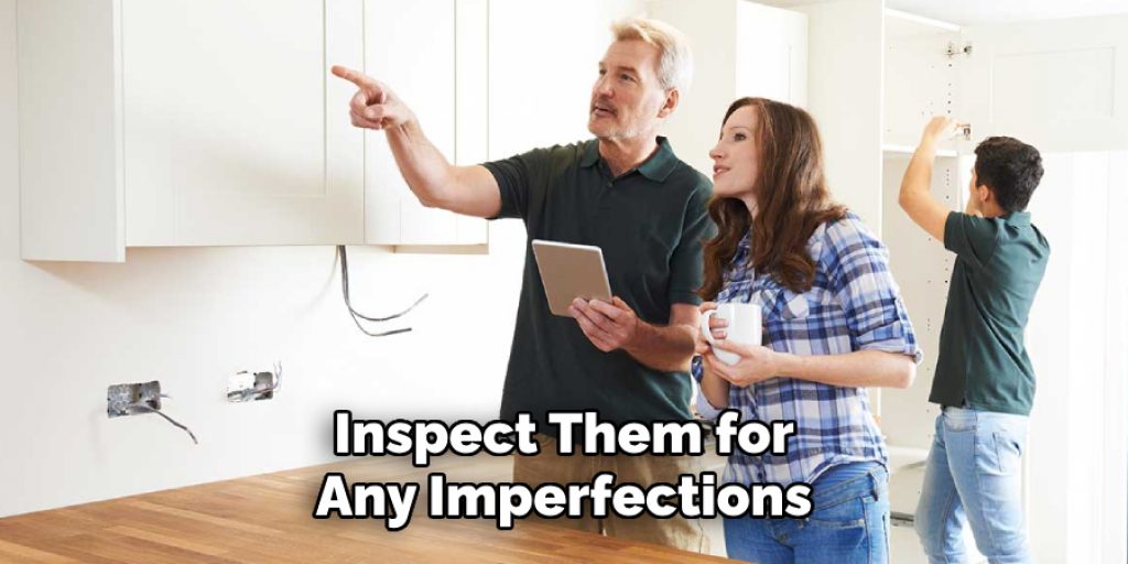 Inspect Them for
Any Imperfections