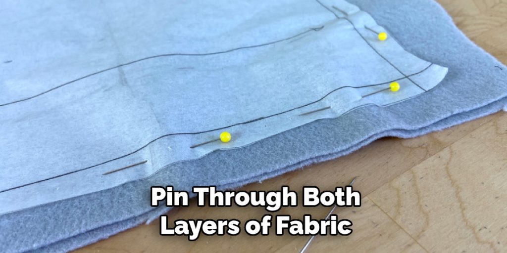 Pin Through Both
Layers of Fabric