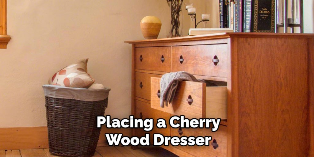 Placing a Cherry
Wood Dresser