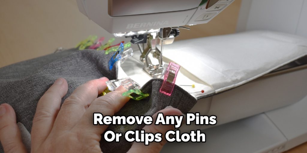 Remove Any Pins
Or Clips Cloth