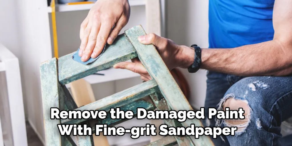 Remove the Damaged Paint
With Fine-grit Sandpaper