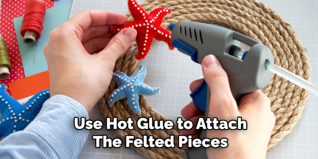 Use Hot Glue to Attach
The Felted Pieces