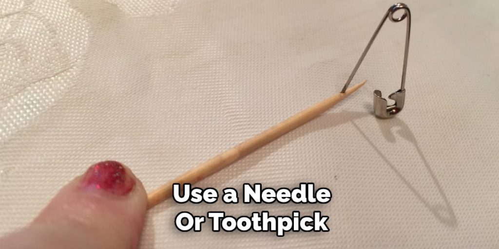 Use a Needle
Or Toothpick