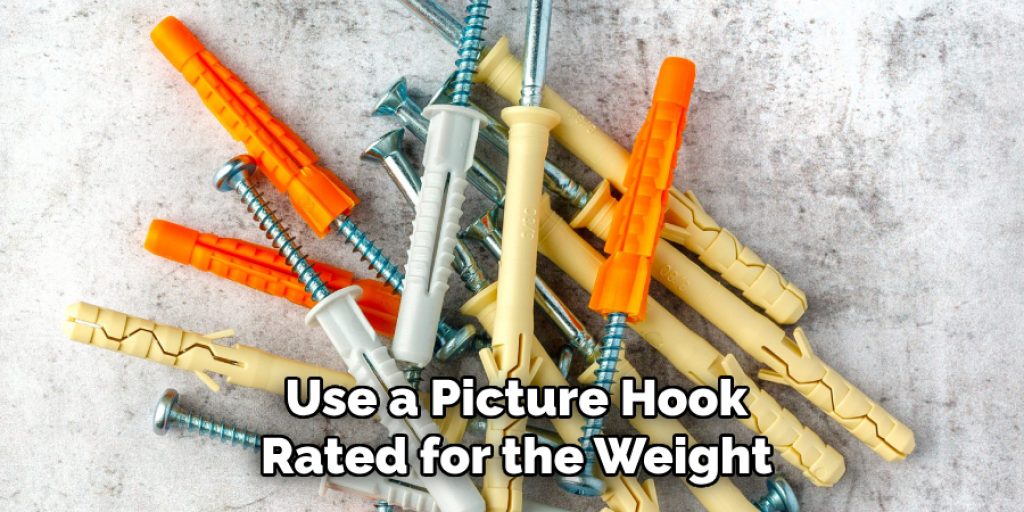Use a Picture Hook
Rated for the Weight