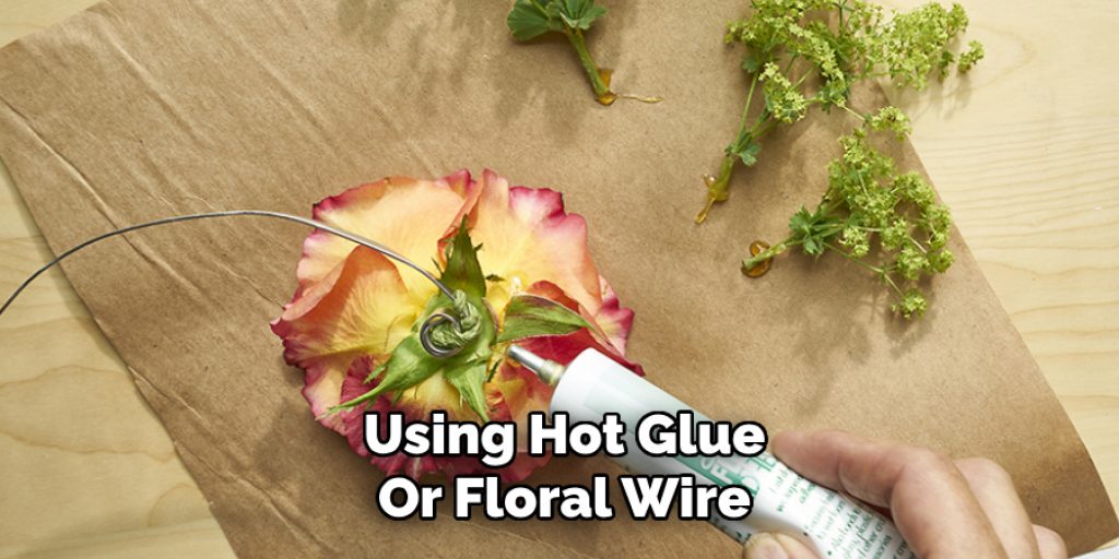 Using Hot Glue
Or Floral Wire