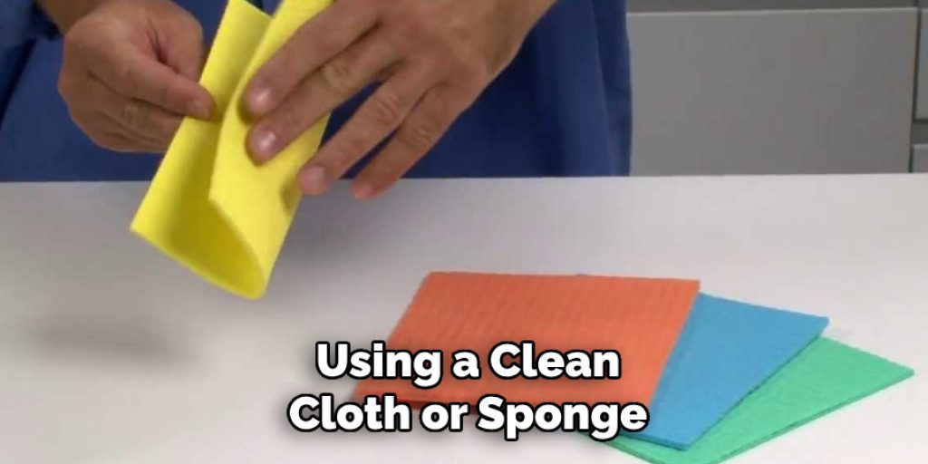 Using a Clean
Cloth or Sponge