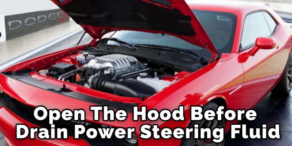 Open The Hood of Car Before Drain Power Steering Fluid