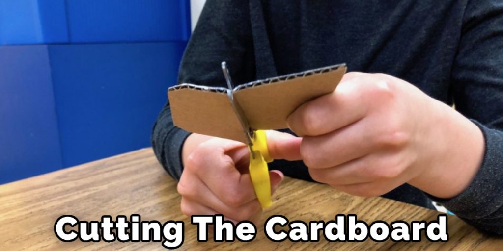 Cutting The Cardboard