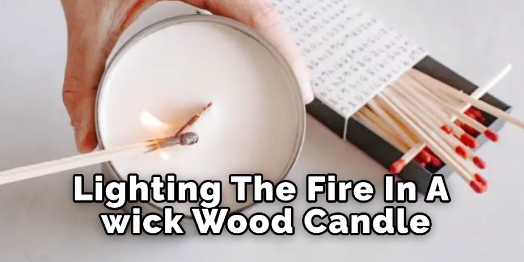 Lighting the fire in a Wood wick Candle