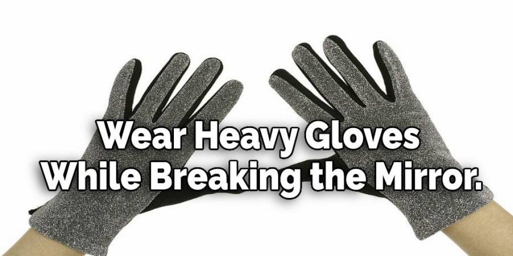 Wear Heavy Gloves While Breaking the Mirror.