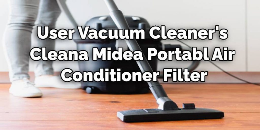 User Vacuum Cleaner's Clean
 a Midea Portable Air 
Conditioner Filter