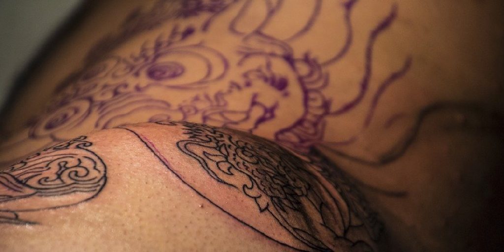 how to transfer tattoo stencil to skin with wax paper