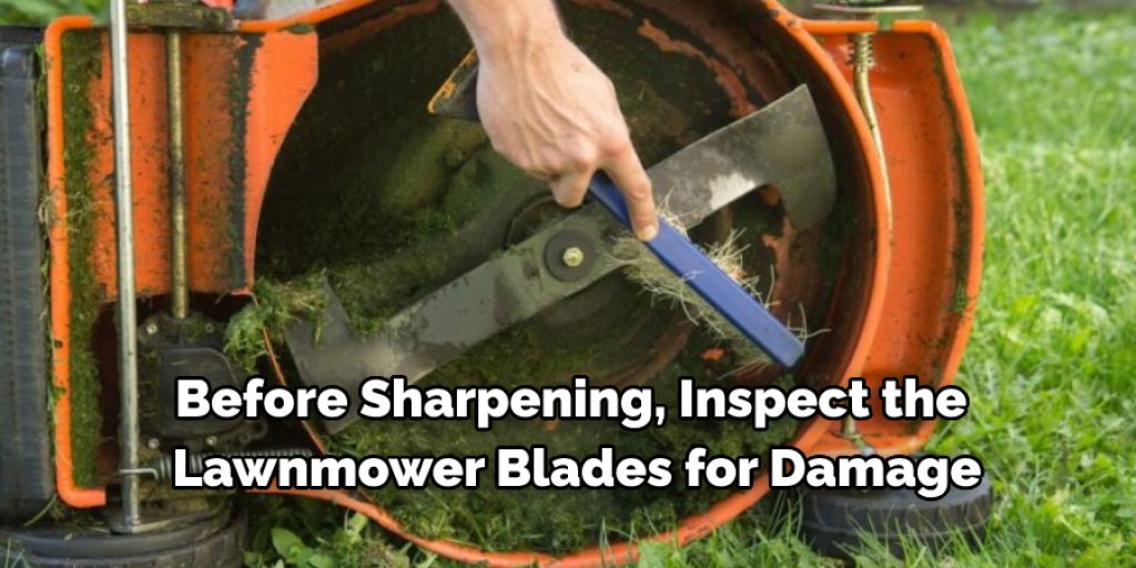 Before sharpening, inspect the lawnmower blades for damage. 