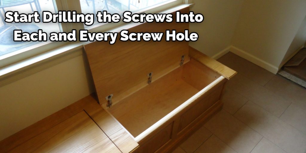 start drilling the screws into each and every screw hole