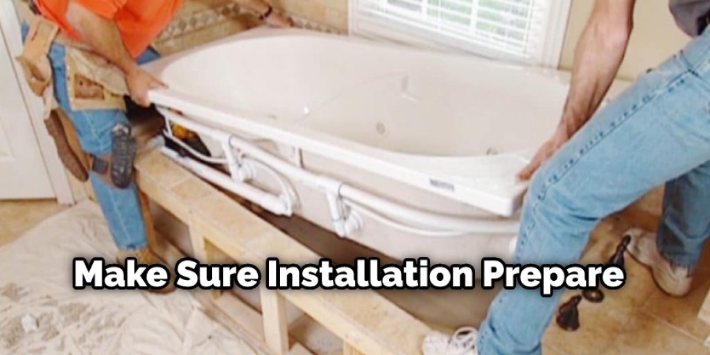 Then, place a level on top of the tub and make sure that it is entirely straight. Use bricks or some other weight if necessary to keep the tub from moving while you prepare for installation.