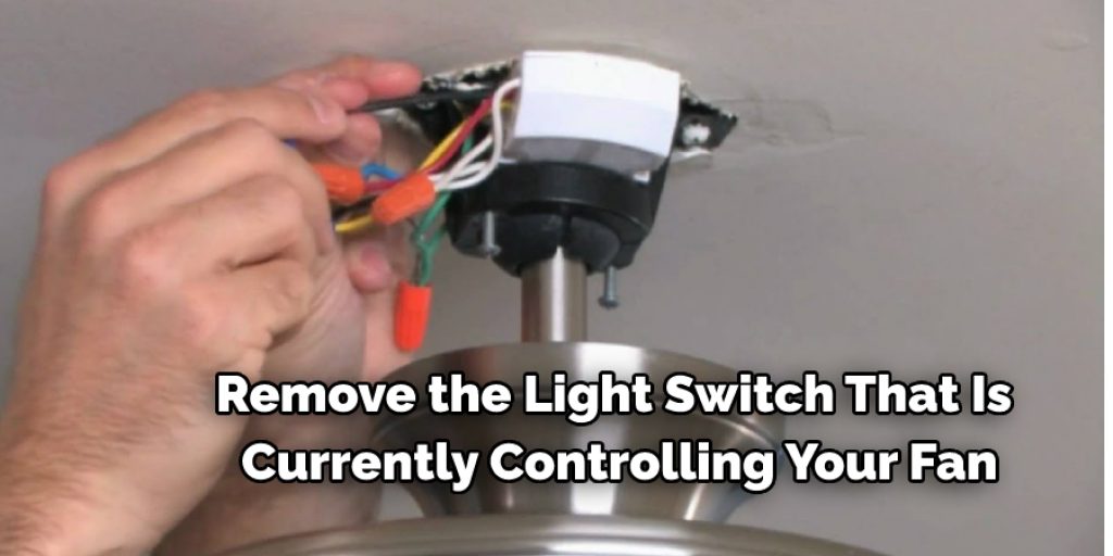 Remove the light switch that is currently controlling your fan.