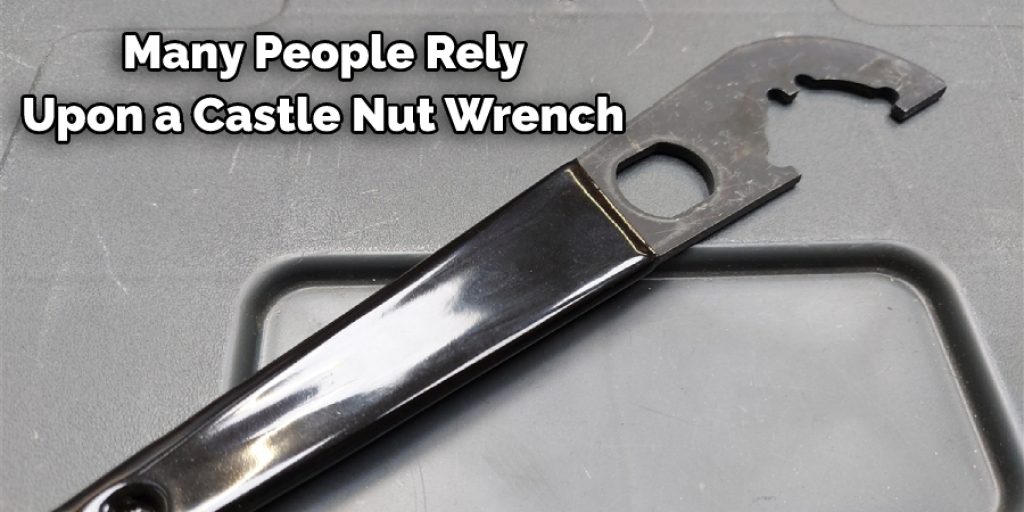 Many people rely upon a castle nut wrench to remove the castle nut properly. 