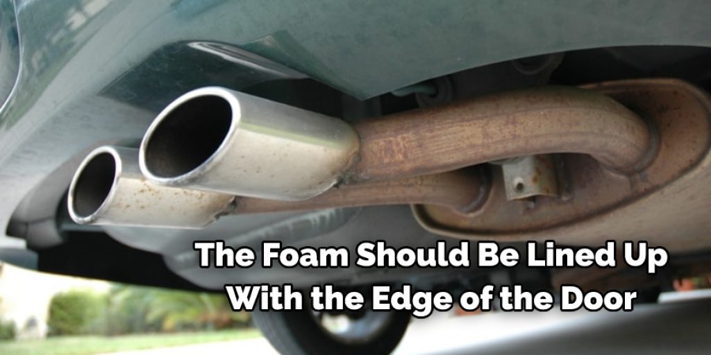 The foam should be lined up with the edge of the door and should overlap the hump