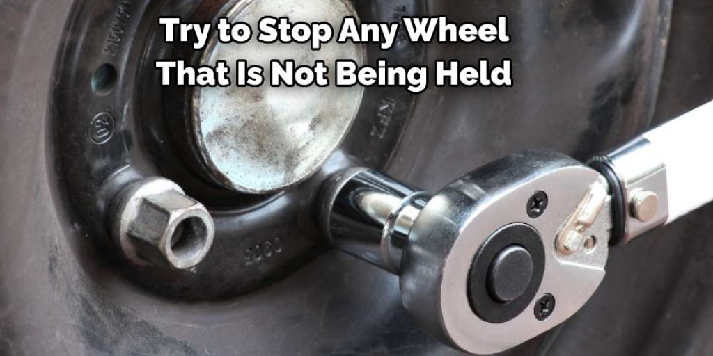 Try to Stop Any Wheel 
That Is Not Being Held 