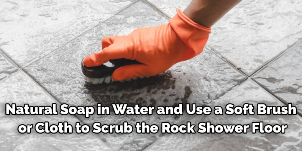 Use Mild Soap and Water to Clean Rock Shower Floor