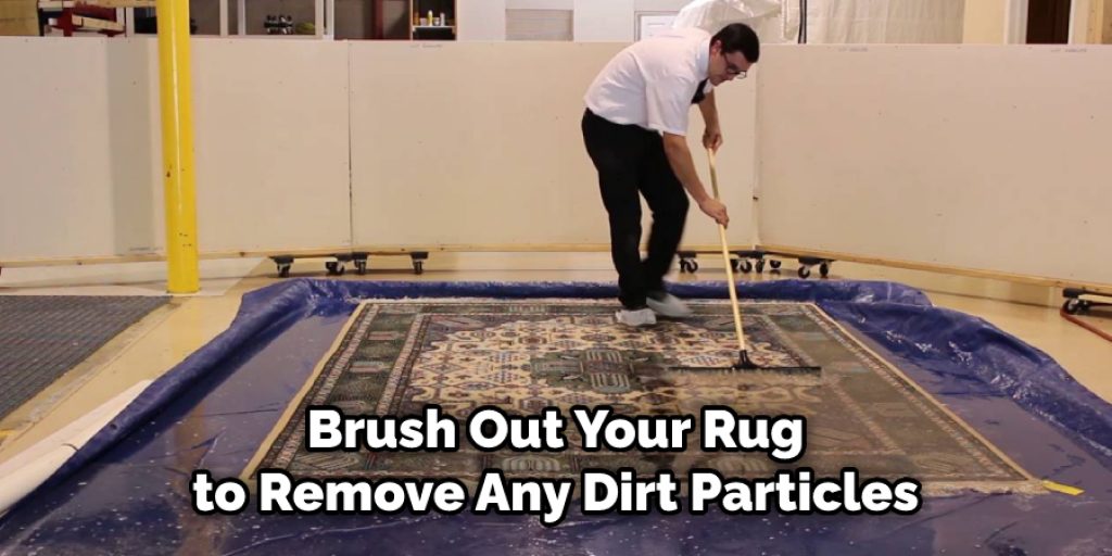 Brush Out Your Rug to Remove Any Dirt Particles