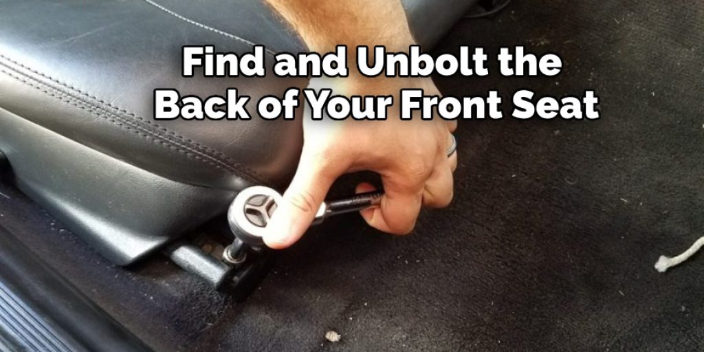 Find and Unbolt the Back of Your Front Seat