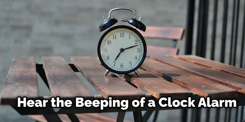 Hear the Beeping of a Clock Alarm